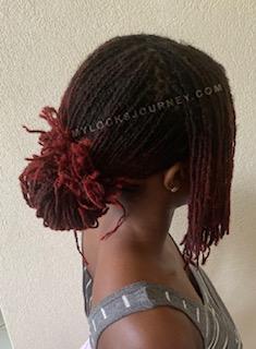messy loc bun with bang