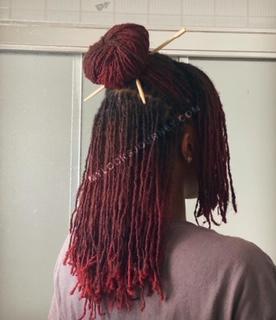 loc bun with chopsticks - red locs